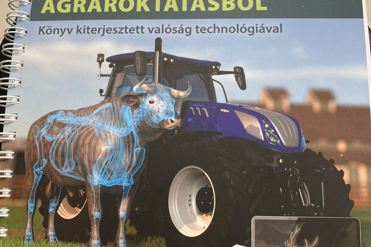 Egy magyar kiadvány borítója, amelyen egy futurisztikus kék átlátszó tehén egy lila traktort fed le, laptop képernyőjén vadvilág és mezőgazdasági gépek képei láthatók.